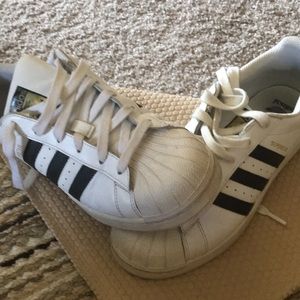 Adidas superstar sneaker used.